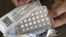 FILE - A one-month dosage of hormonal birth control pills is displayed in Sacramento, Calif., Aug. 26, 2016. A drug company is seeking U.S. approval for the first-ever birth control pill that women could buy without a prescription. The request from a French drugmaker sets up a high-stakes decision for the Food and Drug Administration amid the political fallout from the Supreme Court's recent decision overturning Roe v. Wade. (AP Photo/Rich Pedroncelli, File)