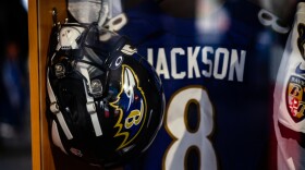  Lamar Jackson helmet and jersey. 