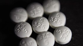 FILE - This Aug. 15, 2017 file photo shows an arrangement of pills of the opioid oxycodone-acetaminophen, also known as Percocet, in New York. Ohio is ready to begin distributing millions of dollars in opioid settlement money to community and government organizations, an influx eagerly anticipated since the first sums were secured in 2021. The OneOhio Recovery Foundation, which has been tasked with distributing over $860 million of settlements reached with drugmakers and pharmaceutical companies for their roles in the national opioid crisis, plans to release its formal request for proposals Monday, March 4, 2024. (AP Photo/Patrick Sison, File)