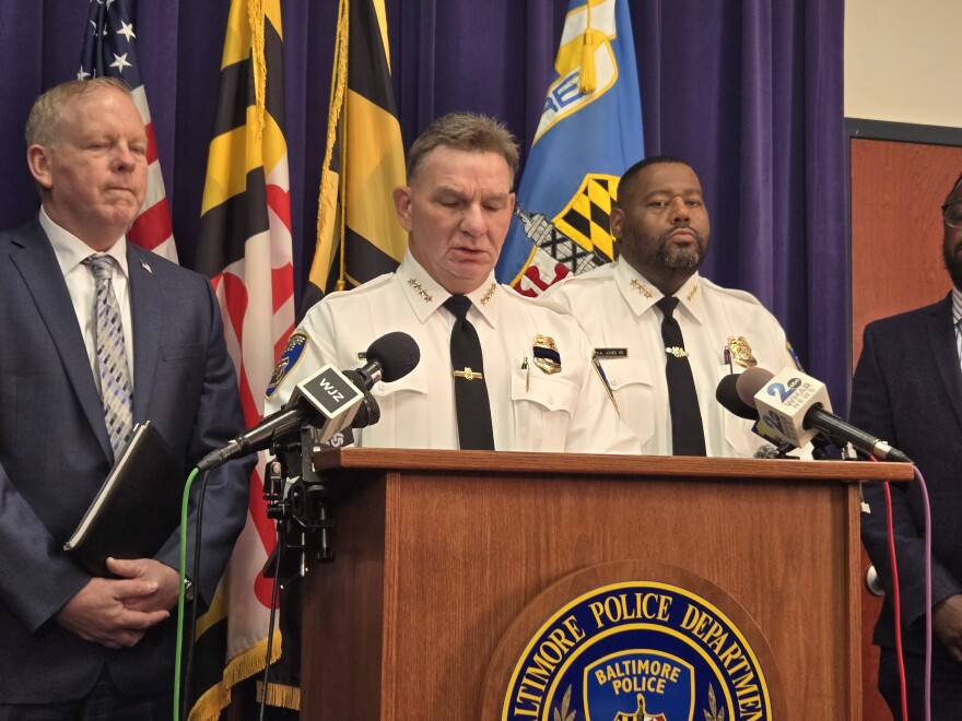 Deputy Commissioner Brian Nadeau of the Public Integrity & Compliance Bureau (left) and Commissioner Richard Worley (center) brief reporters on body camera footage during a press viewing in October. 