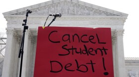 A sign reading "cancel student debt" is seen outside the Supreme Court, Friday, June 30, 2023, in Washington. A sharply divided Supreme Court has ruled that the Biden administration overstepped its authority in trying to cancel or reduce student loans for millions of Americans. Conservative justices were in the majority in Friday’s 6-3 decision that effectively killed the $400 billion plan that President Joe Biden announced last year. (AP Photo/Mariam Zuhaib)