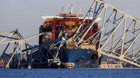 Wreckage of the Francis Scott Key Bridge rests on the container ship Dali, Saturday, March 30, 2024, in Baltimore, Md. (AP Photo/Julia Nikhinson)