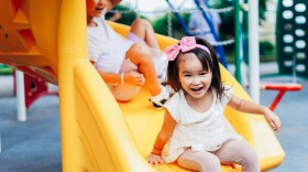 Sisters playing together in the park