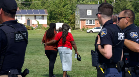 A guardian and student leave Joppetowne High School in Harford County, Friday, Sept. 6, 2024, after the sheriff's office and emergency personnel flocked to campus after a fight resulted in one student being injured. (Kaitlin Newman/The Baltimore Banner)