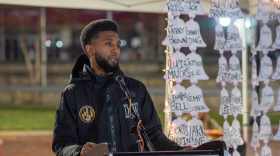 Baltimore Mayor Brandon Scott gives remarks during the 2nd annual Homeless Persons' Memorial Day service at McKeldin Square in Downtown Baltimore. (Philip Muriel for the Baltimore Banner)