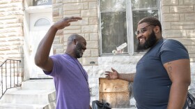 Roca Youth Worker Calvin Monroe (left) and Roca participant Raynard Smith share a moment. Roca is partnering with the Maryland Department of Juvenile Services to teach Cognitive Behavioral Theory to DJS caseworkers, expanding its reach. Photo credit: Roca