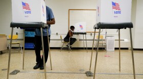 People cast votes at Edmondson Westside High School during Maryland's primary election in Baltimore. Goucher College polled recently voters about top issues in the General Election.