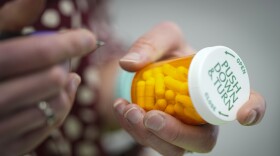 Jessi Stout, owner of the Table Rock Pharmacy fills a prescription on Friday, Jan. 6, 2023, in Morganton, N.C. Drugstore chains are still trying to find enough employees to put a stop to temporary pharmacy closures. (AP Photo/Chris Carlson)