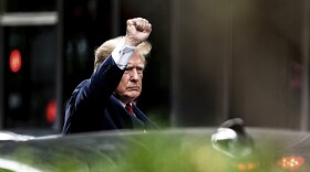 Former President Donald Trump gestures as he departs Trump Tower, Wednesday, Aug. 10, 2022, in New York, on his way to the New York attorney general's office for a deposition in a civil investigation. (AP Photo/Julia Nikhinson)