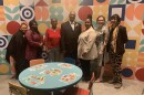 Baltimore City Schools’ Food and Nutrition Services team with exhibit curator Beth Maloney (second to the right)