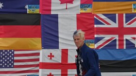 This photograph taken on June 23, 2022 in Ukraine, shows U.S. citizen Ryan Routh sticking up national flags of the countries helping Ukraine. Routh, now 58, faces federal charges on the attempted assassination of former President Donald Trump at his West Palm Beach, Fla. golf course on September 15, 2024.