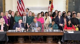 Maryland Governor Wes Moore signs bills into law in Annapolis on Wednesday, May 3, 2023. Photo by Matt Bush/WYPR.