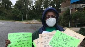 School bus driver Stephannie Wilson protests outside the Baltimore County School Board. Credit: John Lee