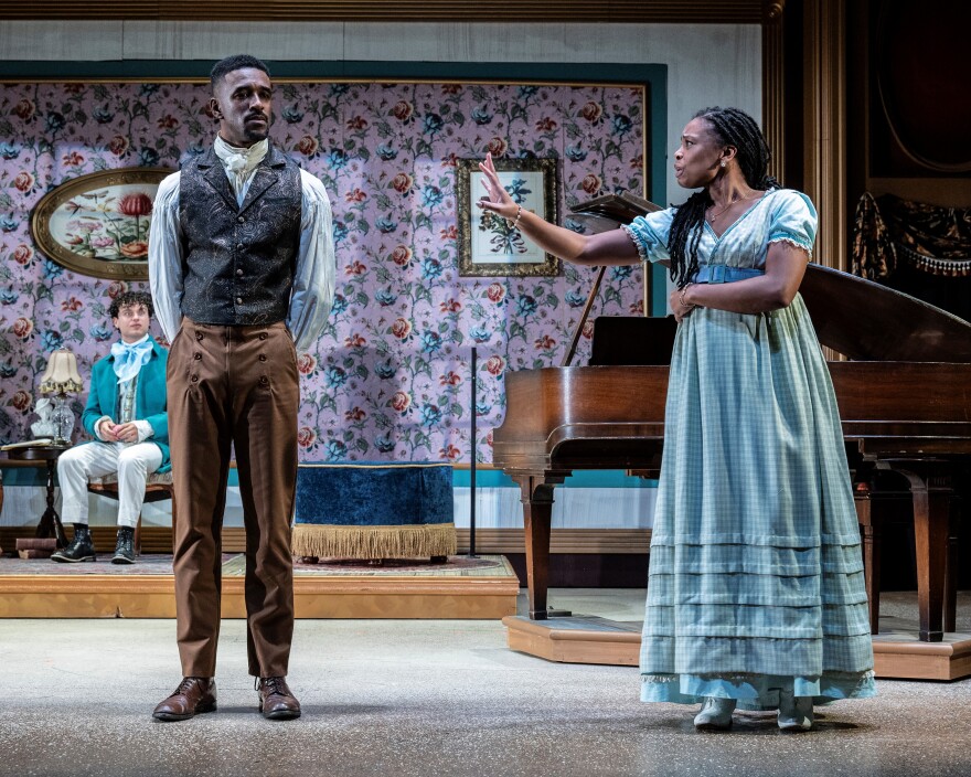 Alexander Matos as Mr. Collins (in background), Malik Esoj Childs as Mr. Darcy and Lizzy Brooks as Lizzy Bennet