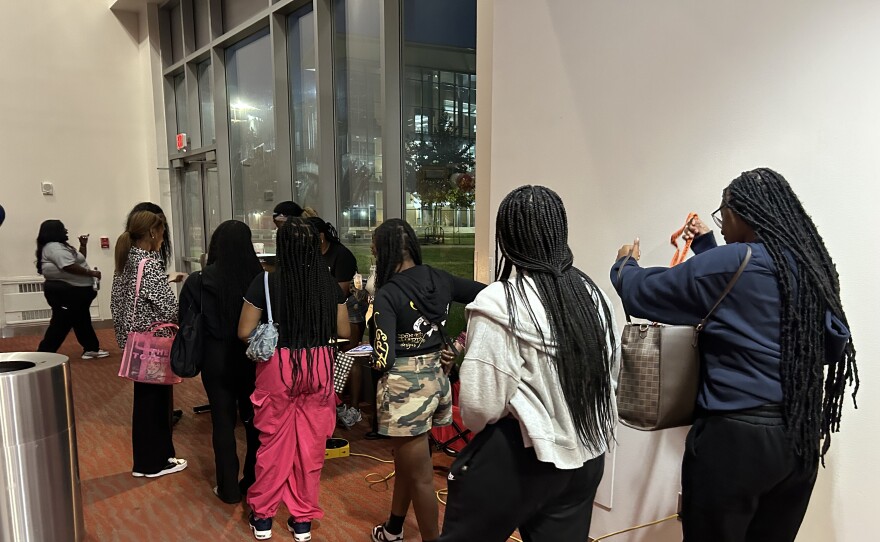 MSU students line up for popcorn before entering the theater to watch the presidential debate. Photo by Wambui Kamau/WYPR.