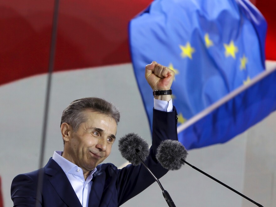 Billionaire Bidzina Ivanishvili, leader of the Georgian Dream party, greets demonstrators during a rally in Tbilisi, Georgia, on April 29.