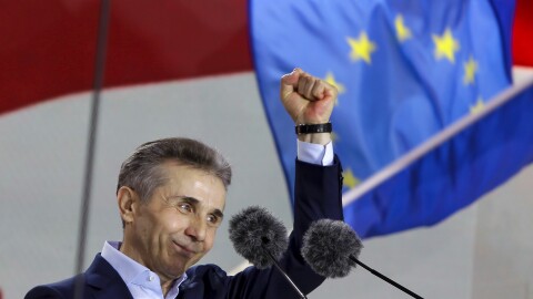 Billionaire Bidzina Ivanishvili, leader of the Georgian Dream party, greets demonstrators during a rally in Tbilisi, Georgia, on April 29.