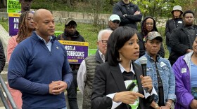 Flanked by Gov. Wes Moore and other supporters, Prince George's County Executive Angela Alsobrooks lists economic mobility among her priorities at a campaign event in Baltimore late last month. Rachel Baye/WYPR