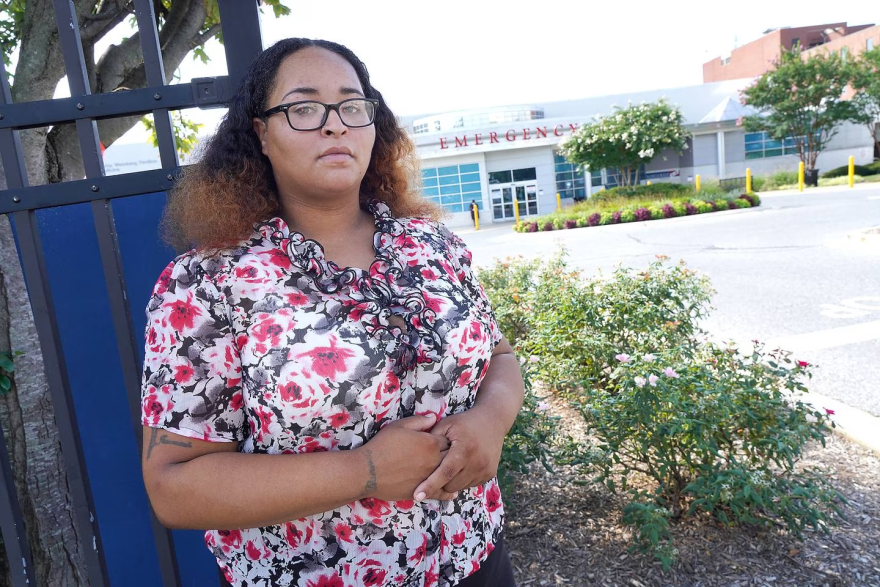 Jessica Boyd stands outside of Northwest Hospital, where her son was hospitalized after three months in a different hospital in Western Maryland. Photo by Kirk McKoy/The Baltimore Banner