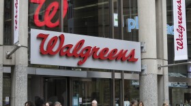 FILE - The entrance to a Walgreens is seen on Oct. 14, 2022, in Boston. Walgreens lost nearly $6 billion in its fiscal second quarter mainly due to a drop in value for a VillageMD clinic business it controls. Excluding that charge, the drugstore chain reported results Thursday, march 28, 2024 that topped Wall Street expectations.. (AP Photo/Michael Dwyer, File)