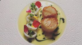 A scallop and calamari dish from Chef Wolf - Credit: @chefwolf/Instagram