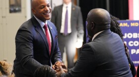 Maryland Gov. Wes Moore greets people before President Joe Biden speaks about the economy to union members at the IBEW Local Union 26, Wednesday, Feb. 15, 2023, in Lanham, Md.