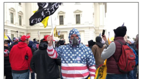 An image from federal court documents allegedly shows Carlos Ayala at the U.S. Capitol on Jan. 6, 2021. Ayala is charged with civil disorder and other charges. Credit: Federal court documents