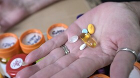 Retiree Donna Weiner shows some of the daily prescription medications that she needs and pays over $6,000 a year through a Medicare prescription drug plan at her home, Tuesday, Oct. 5, 2021, in Longwood, Fla. (AP Photo/Phelan M. Ebenhack)