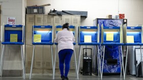 FILE - A voter casts her ballot, April 2, 2024, in Milwaukee, Wis. (AP Photo/Morry Gash, File)