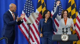 Maryland Gov. Wes Moore (left) applauds as U.S. Vice President Kamala Harris (right) endorses U.S. Senate candidate Angela Alsobrooks last month. Moore is now endorsing Harris for president. (Ulysses Muñoz/The Baltimore Banner)