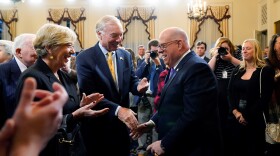 Maryland Gov. Larry Hogan, right, is greeted by supporters after he gave his farewell speech at the Maryland statehouse, Tuesday, Jan. 10, 2023, in Annapolis, Md. (AP Photo/Julio Cortez)