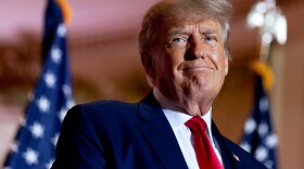 FILE - Former President Donald Trump announces he is running for president for the third time as he smiles while speaking at Mar-a-Lago in Palm Beach, Fla., Nov. 15, 2022. A lawyer for Trump said Thursday, March 30, 2023, that he has been told that the former president has been indicted in New York on charges involving payments made during the 2016 presidential campaign to silence claims of an extramarital sexual encounter.