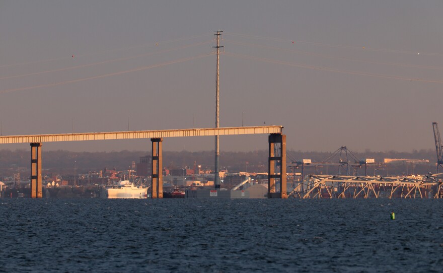 The collapsed Francis Scott Key Bridge is shown over the Patapsco River after being struck by a cargo ship on Tuesday.