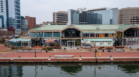 A view of Baltimore's Inner Harbor and historic ship taken with a drone. (Marcus Payne for The Baltimore Banner)