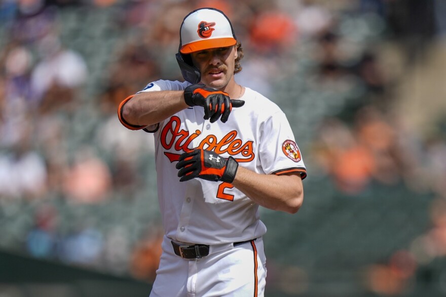 Baltimore Orioles' Gunnar Henderson celebrates after hitting a single during the first inning of a baseball game against the San Francisco Giants, Thursday, Sept. 19, 2024, in Baltimore. (AP Photo/Stephanie Scarbrough)