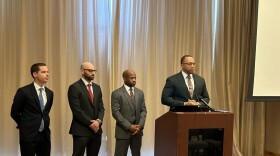 From left to right: Kevin Mahoney, Michael Rath, Chris Stewart and Justin Miller. These attorneys are representing the families of two of the men who died in the Key Bridge collapse as well as the sole survivor of the collapse who was rescued from the water. Photo by Wambui Kamau/WYPR.