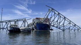 The fallen Francis Scott Key Bridge in Baltimore is pictured Sunday, March 31, 2024, where divers assisted crews with the complicated and meticulous operation of removing steel and concrete. (AP Photos/Mike Pesoli)