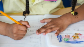 A student works on an assignment in reading class at Montebello Elementary/Middle School on Tuesday, June 6, 2023. Schools throughout the state are beginning to shift toward using a phonics-based style of reading instruction, which is also known as “the science of reading.” (Ulysses Muñoz/The Baltimore Banner)