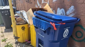 Baltimore City trash and recycling bins.