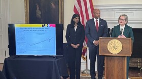 Maryland Budget & Management Secretary Helene Grady speaks at statehouse in Annapolis, Maryland on Friday with Governor Wes Moore and Lieutenant Governor Aruna Miller looking on.