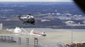 President Joe Biden, aboard Marine One, takes an aerial tour of the collapsed Francis Scott Key Bridge in Baltimore, Friday, April 5, 2024, as seen from an accompanying aircraft. (AP Photo/Manuel Balce Ceneta)