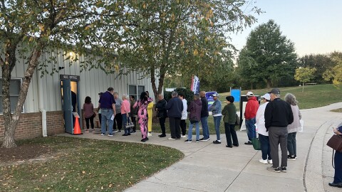 People line up Thursday, October 24, 2024 at the Honeygo Run Community Center in Perry Hall for the first day of early voting. Photo by John Lee/WYPR.