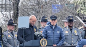 Maryland Gov. Wes Moore (center) speaks as President Joe Biden looks on. The president arrived in Baltimore on Friday for an aerial tour of the wreckage of the Francis Scott Key Bridge. After surveying the damage that left six construction workers dead, the president delivered public remarks. Photo by Emily Hofstaedter/WYPR.