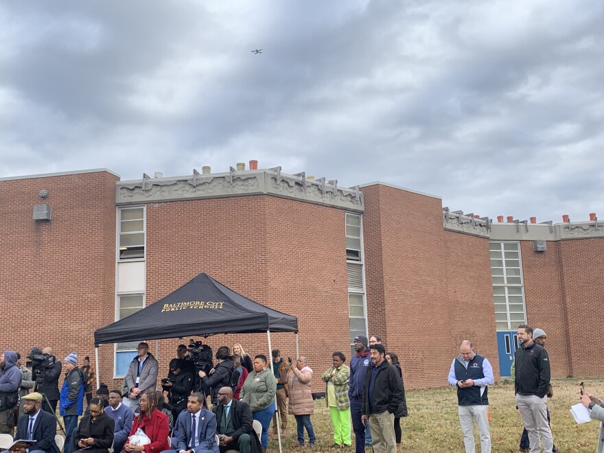 The roof of the school on Furley Avenue is lined with five-gallon buckets.