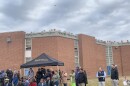 The roof of the school on Furley Avenue is lined with five-gallon buckets.