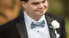 Photo of a young man in a tuxedo